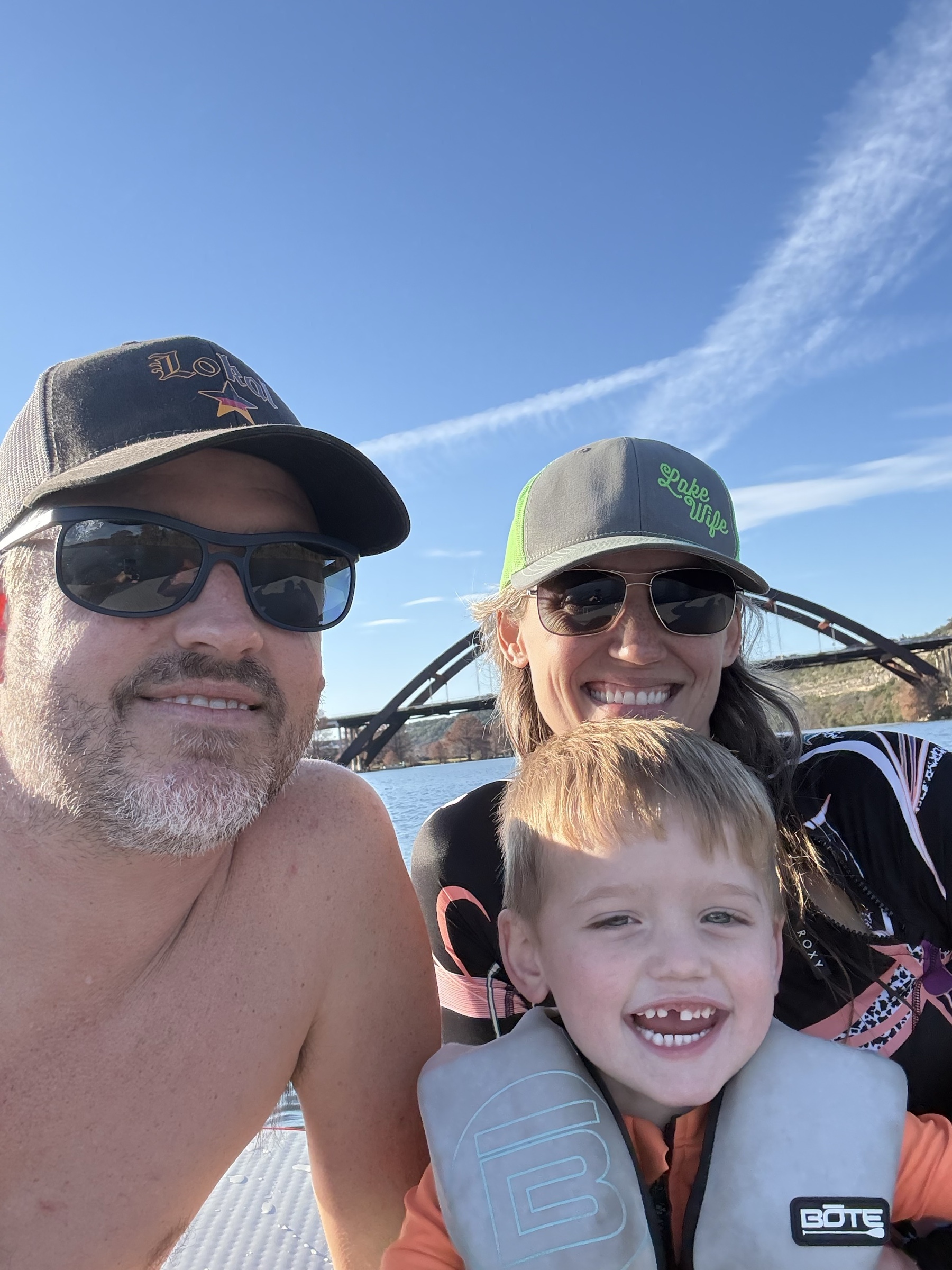 Family on the boat at Canyon Lake